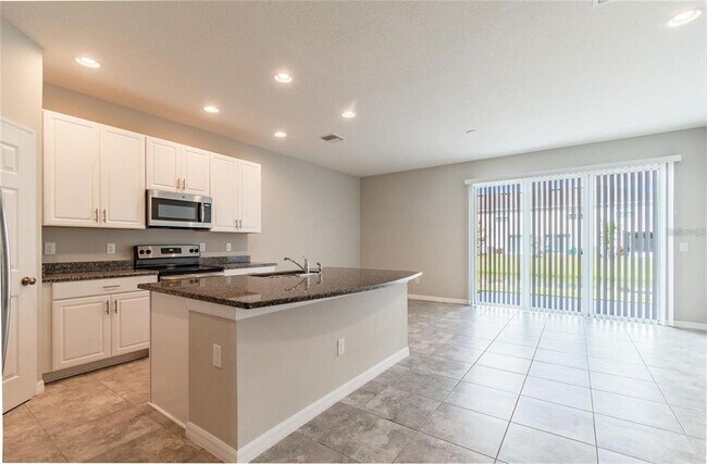 7009 Grand Elm Dr in Riverview, FL - Building Photo - Building Photo