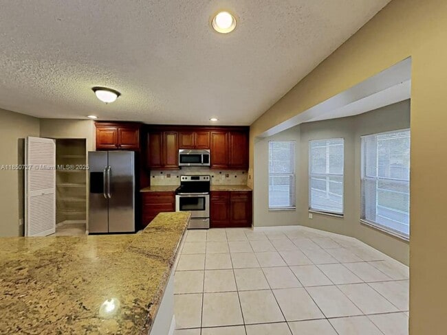 property at 4727 NW 3rd Ct