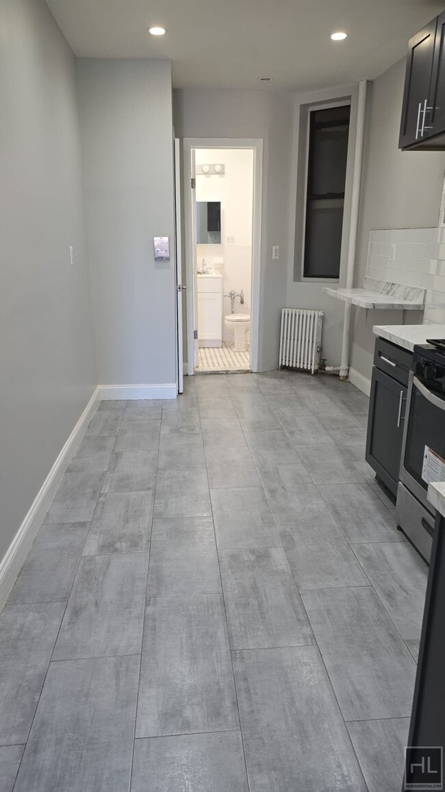 property at 65 Malcolm X Blvd