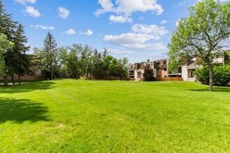 Pineridge Greene Apartments in Calgary, AB - Building Photo - Building Photo