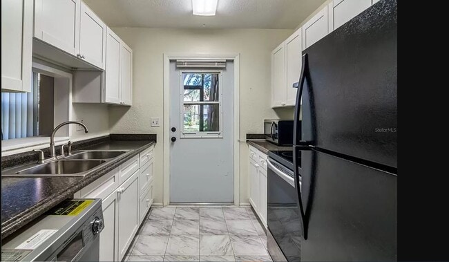 5419 Hansel Ave, Unit Camelot by the Lake in Orlando, FL - Foto de edificio - Building Photo