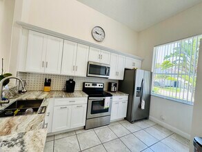 6752 Green Island Cir in Greenacres, FL - Building Photo - Building Photo