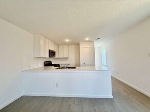 10319 Munoz Mnr in San Antonio, TX - Building Photo - Building Photo