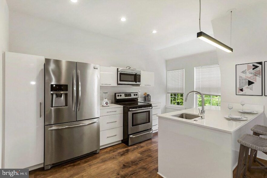 18 E Lancaster Ave, Unit 2B-PH-06 in Penn Wynne, PA - Building Photo