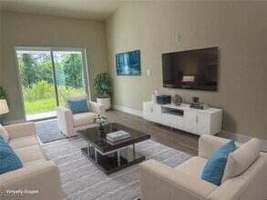 876 Apartment St in Lehigh Acres, FL - Building Photo - Building Photo