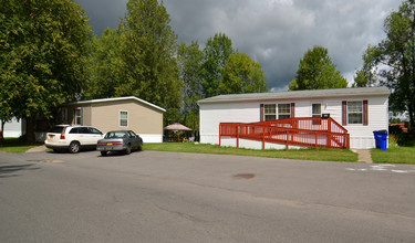 Madison Village in Liverpool, NY - Building Photo - Building Photo