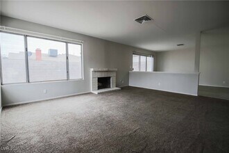 7019 Grassy Knoll St in Las Vegas, NV - Building Photo - Building Photo