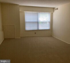 7640 Tremayne Pl-Unit -203 in McLean, VA - Building Photo - Building Photo