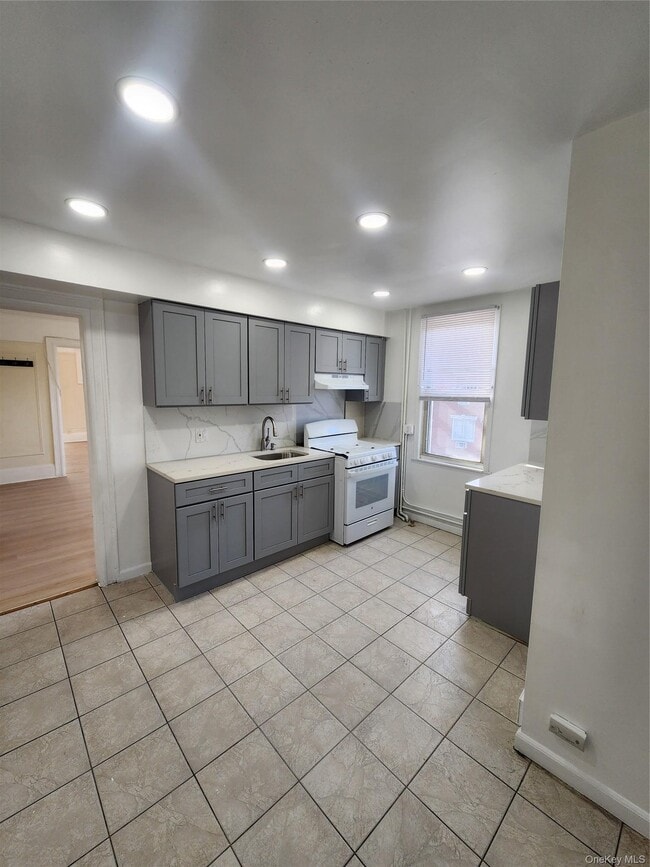 property at 82-03 Myrtle Ave