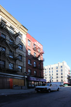 58-68 Kenmare St in New York, NY - Building Photo - Building Photo