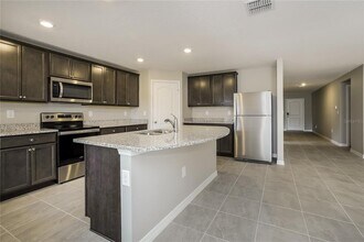 1698 Hideaway Flat St in Mascotte, FL - Building Photo - Building Photo