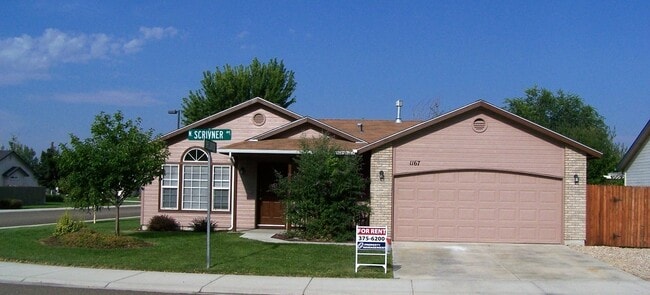 1167 N Scrivner Ave