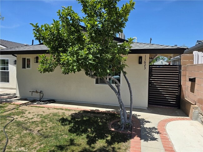 property at 11623 Paso Robles Ave