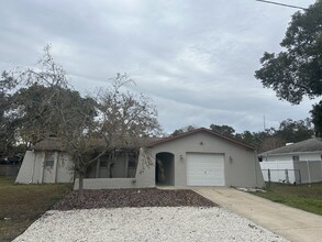 3475 Hartley Rd in Spring Hill, FL - Building Photo - Building Photo