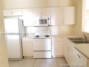 1049 Golden Lakes Blvd in Royal Palm Beach, FL - Building Photo - Building Photo