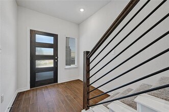 806 Pepperbark Loop in Mustang Ridge, TX - Building Photo - Building Photo