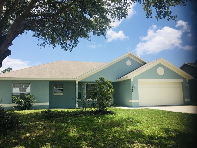 property at 1044 SW Ingrassina Ave