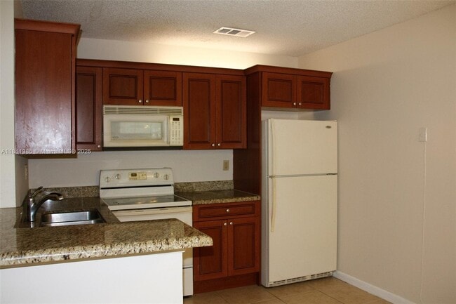 11462 NW 43rd St in Coral Springs, FL - Building Photo - Building Photo
