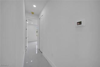 708 Poinsettia Ave in Lehigh Acres, FL - Foto de edificio - Building Photo