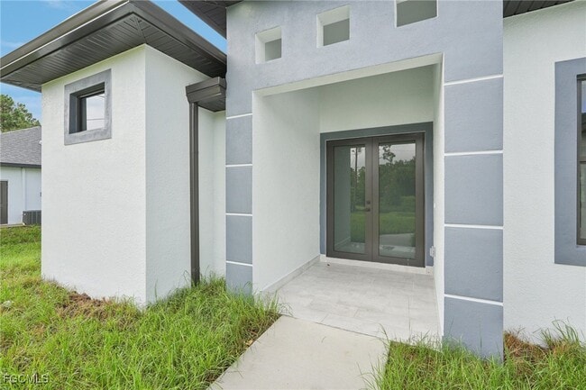 872 Spaulding St E in Lehigh Acres, FL - Building Photo - Building Photo
