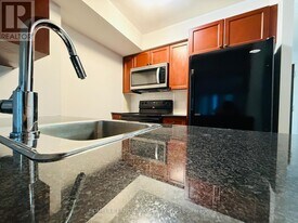 135 Village Green Square in Toronto, ON - Building Photo