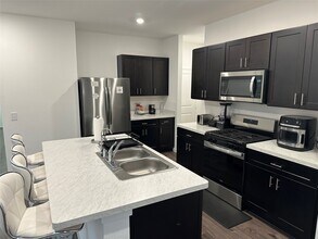 16936 Juniper Blossom Bnd in Conroe, TX - Building Photo - Building Photo