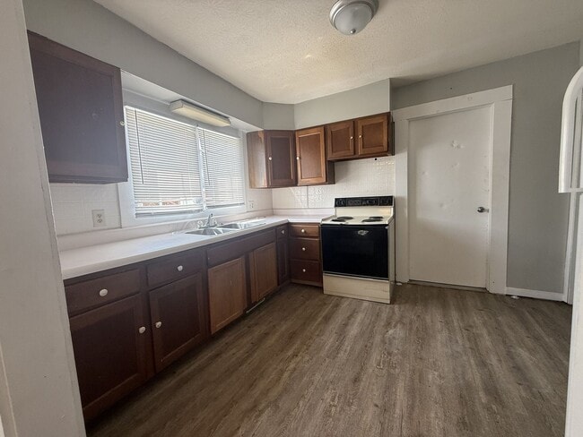 property at 114 E 9th St