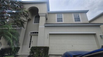 7751 Basnett Cir in Kissimmee, FL - Building Photo