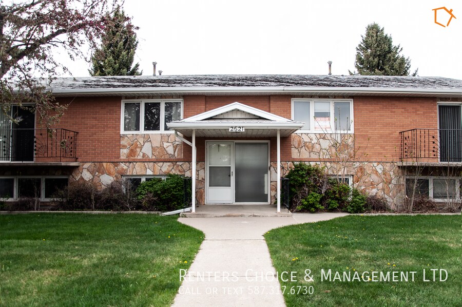 2 Bedroom, Assigned Parking, Onsite Laundry in Lethbridge, AB - Building Photo