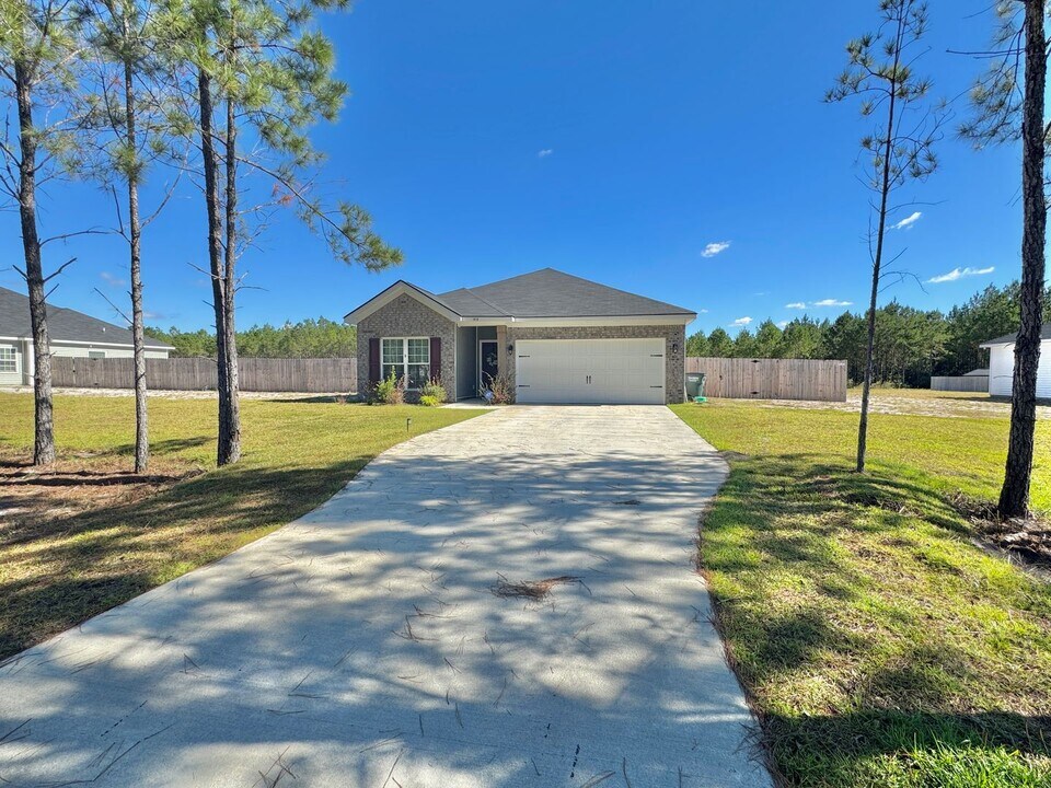 1414 Arnall Dr in Ludowici, GA - Building Photo