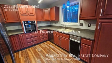 21433 Baron Dr in Anchorage, AK - Building Photo - Building Photo