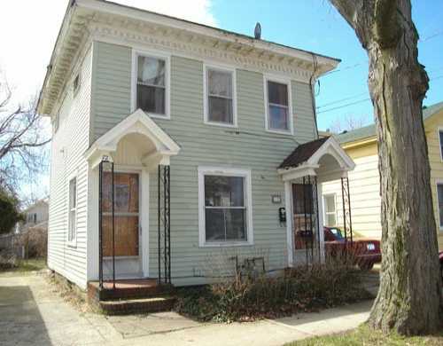 72 W Seventh St in Oswego, NY - Building Photo