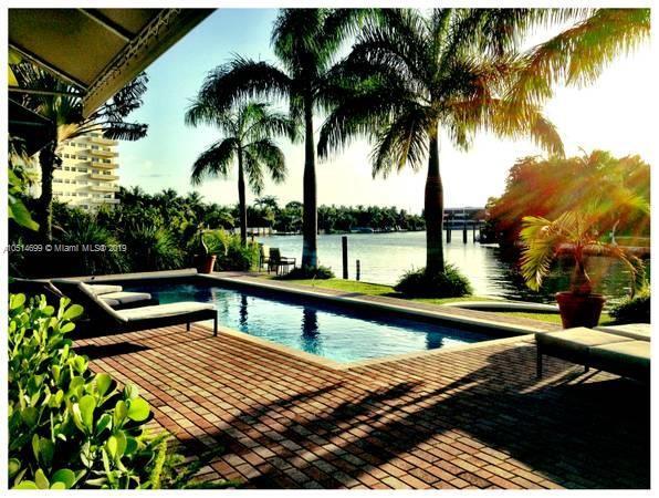 4780 Pine Tree Dr, Unit 4050 in Miami, FL - Building Photo