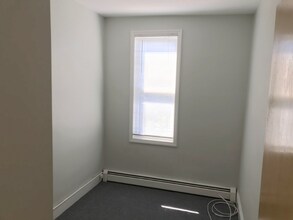 571 Avenue A in Bayonne, NJ - Foto de edificio - Building Photo