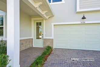 14114 SW Surina St in Port St. Lucie, FL - Building Photo - Building Photo