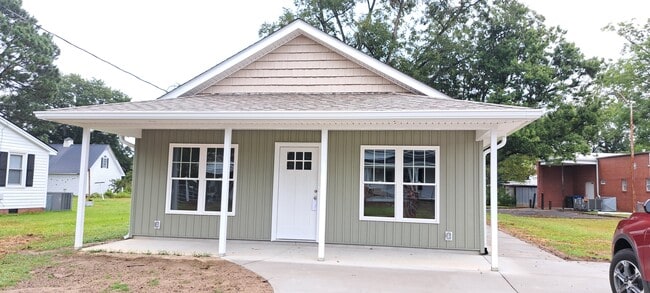 property at 104 N Mill St