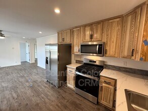 692 E Hahns Peak Ave in Pueblo West, CO - Building Photo - Building Photo