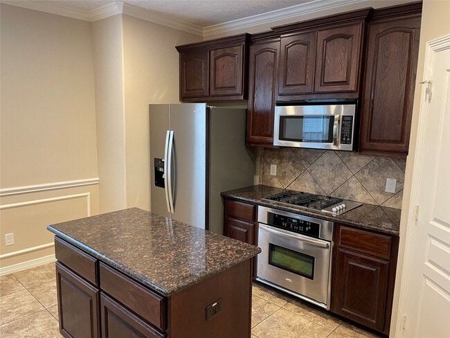 property at 908 W 26th St