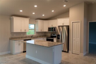 409 Moore Ave in Lehigh Acres, FL - Building Photo - Building Photo