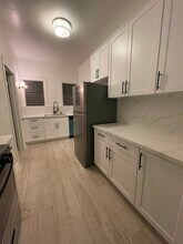 417 N Gardner St, Unit 419 in Los Angeles, CA - Foto de edificio - Building Photo