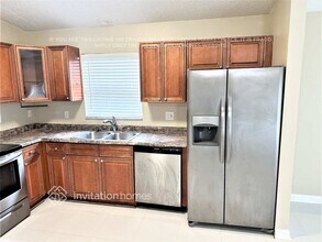 1336 Waterway Cove Dr in Wellington, FL - Building Photo - Building Photo