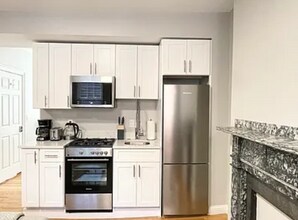 23 Temple St, Unit E3 in Boston, MA - Building Photo - Building Photo
