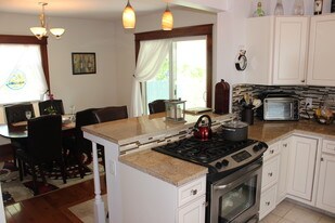 217 Grant St, Unit PH4117 in Elmira, NY - Building Photo