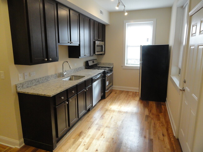 4858 N Drake Ave, Unit 1 in Chicago, IL - Building Photo - Building Photo