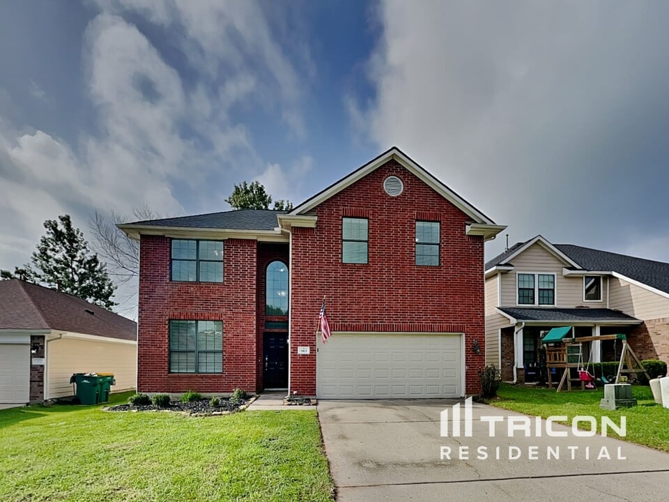 963 Oak Lynn Dr in Willis, TX - Building Photo