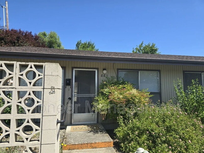 property at 881 NE Alameda Ave