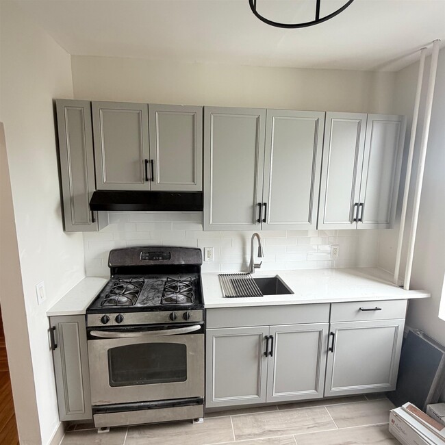 property at 7111 Palisade Ave