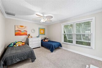 25486 Cockleshell Dr, Unit 806 in Bonita Springs, FL - Building Photo - Building Photo