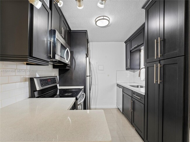 property at 633 S Royal Poinciana Blvd