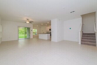 7310 Spring Snowflake Ave in Palm River-Clair Mel, FL - Building Photo - Building Photo